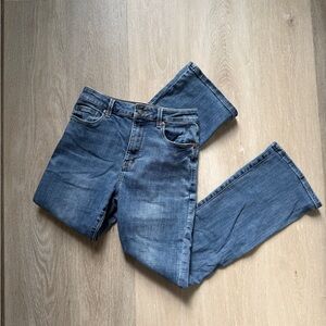 Cosmic blue love boot leg blue jeans high rise sz 27 32”
